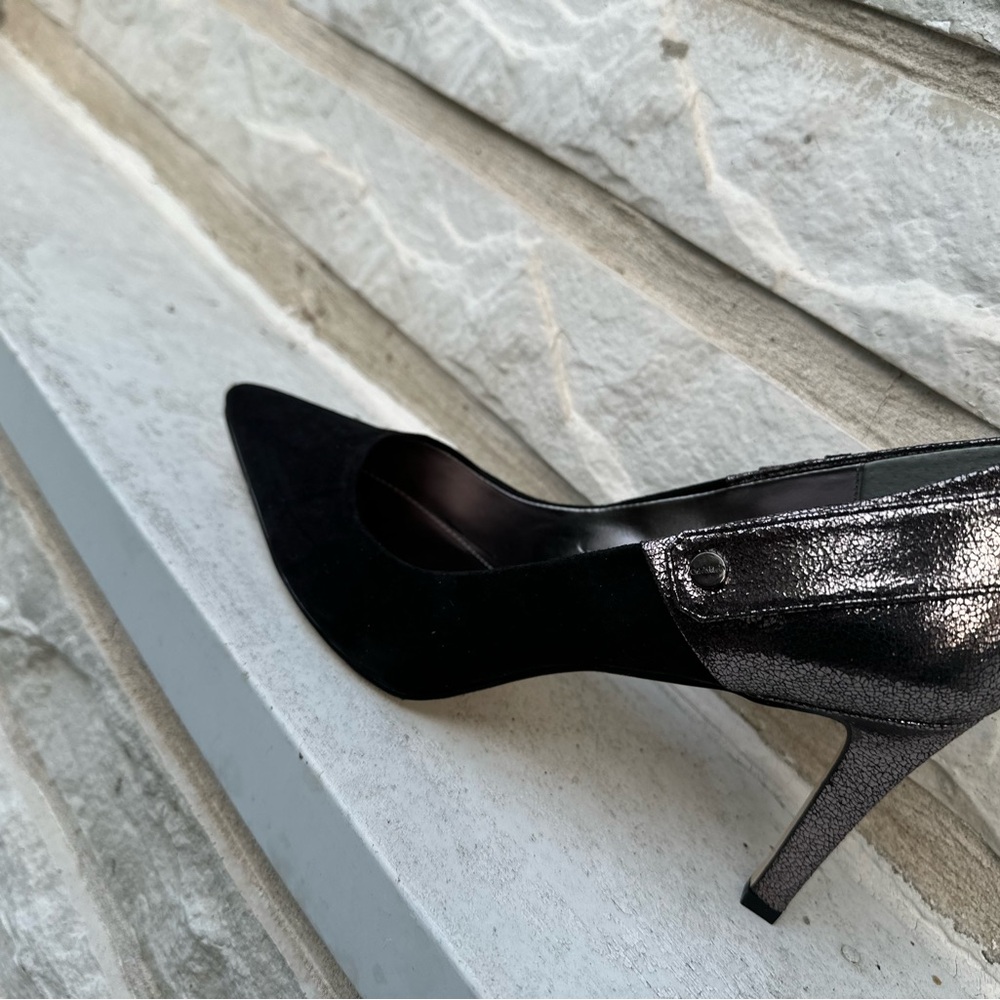 High heels in a 9.50, sexy leather pumps.
